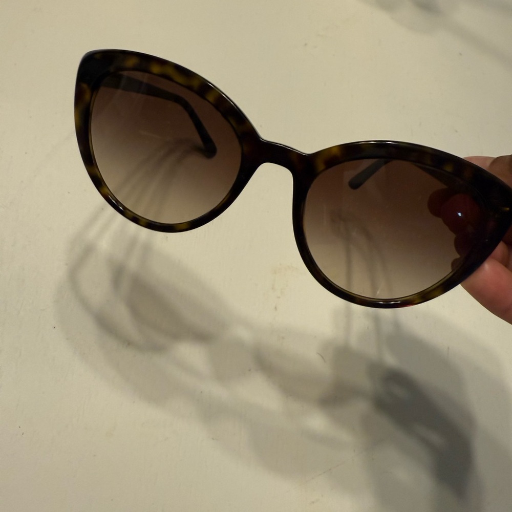 Prada Sunglasses with UV Protection and Polarized Lenses